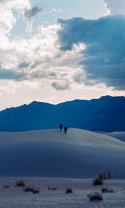 Preview wallpaper desert, people, hill, mountains, distance