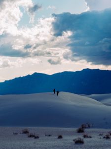 Preview wallpaper desert, people, hill, mountains, distance