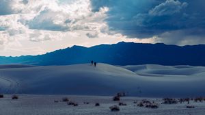 Preview wallpaper desert, people, hill, mountains, distance