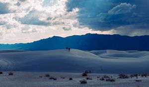 Preview wallpaper desert, people, hill, mountains, distance