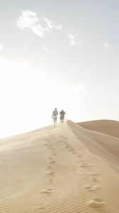 Preview wallpaper desert, people, sand, hills, walk