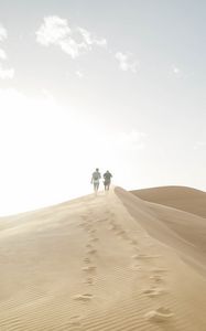 Preview wallpaper desert, people, sand, hills, walk