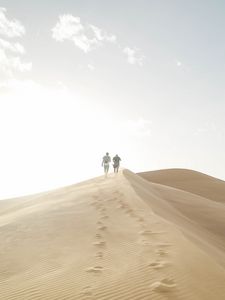 Preview wallpaper desert, people, sand, hills, walk