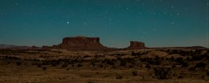 Preview wallpaper desert, rocks, stars, sky, night, dark