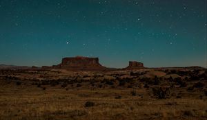 Preview wallpaper desert, rocks, stars, sky, night, dark