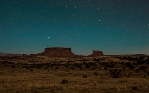 Preview wallpaper desert, rocks, stars, sky, night, dark