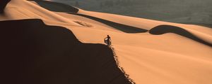 Preview wallpaper desert, sand, dune, man, traces