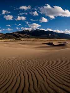 Preview wallpaper desert, sand, dunes, mountains, clouds