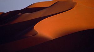 Preview wallpaper desert, sand, dunes, mountains, lines, shade, evening