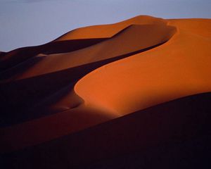 Preview wallpaper desert, sand, dunes, mountains, lines, shade, evening