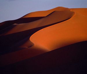 Preview wallpaper desert, sand, dunes, mountains, lines, shade, evening