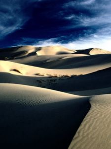 Preview wallpaper desert, sand, dunes, shades, mountains, lines, clouds, sky