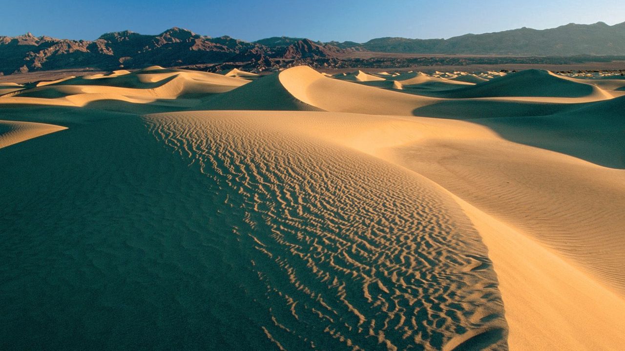 Wallpaper desert, sand, dunes, mountains, clouds, sky, emptiness