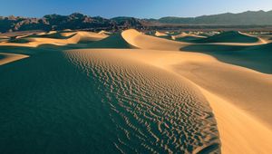 Preview wallpaper desert, sand, dunes, mountains, clouds, sky, emptiness