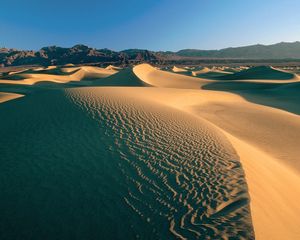 Preview wallpaper desert, sand, dunes, mountains, clouds, sky, emptiness