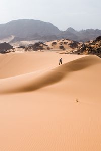 Preview wallpaper desert, sand, heat, person, traveler