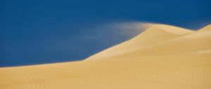 Preview wallpaper desert, sand, hill, dust, sky