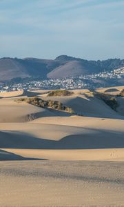 Preview wallpaper desert, sand, hills, city, landscape