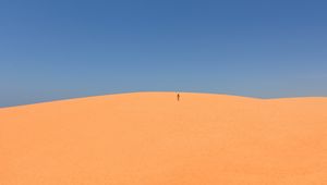 Preview wallpaper desert, sand, man, hill, sky, clean