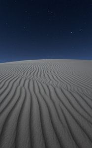 Preview wallpaper desert, sand, night, starry sky, light, wavy