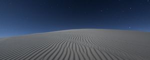 Preview wallpaper desert, sand, night, starry sky, light, wavy