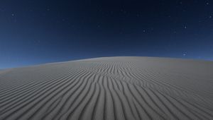 Preview wallpaper desert, sand, night, starry sky, light, wavy