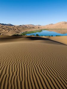 Preview wallpaper desert, sand, patterns, lines, oasis, lake, coast, vegetation