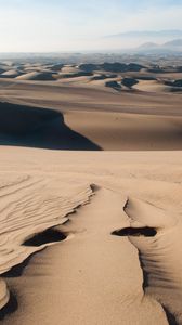 Preview wallpaper desert, sand, traces, distance