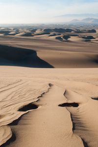 Preview wallpaper desert, sand, traces, distance