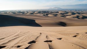 Preview wallpaper desert, sand, traces, distance