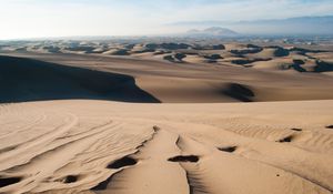 Preview wallpaper desert, sand, traces, distance