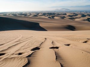 Preview wallpaper desert, sand, traces, distance