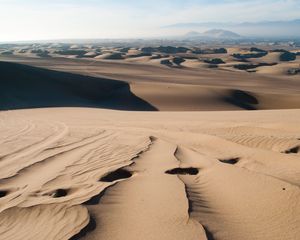 Preview wallpaper desert, sand, traces, distance