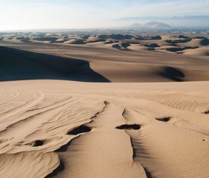 Preview wallpaper desert, sand, traces, distance