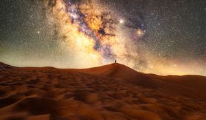 Preview wallpaper desert, silhouette, alone, starry sky, sand, night