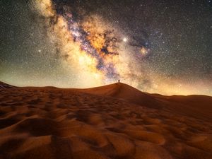 Preview wallpaper desert, silhouette, alone, starry sky, sand, night