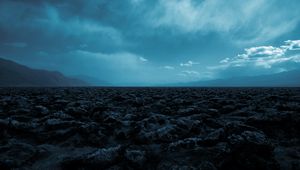 Preview wallpaper desert, stones, mountains, fog, landscape