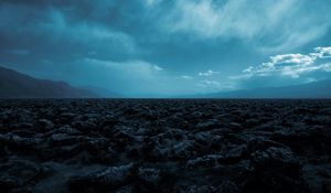 Preview wallpaper desert, stones, mountains, fog, landscape
