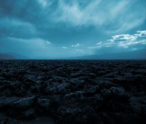 Preview wallpaper desert, stones, mountains, fog, landscape