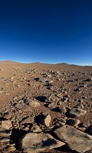 Preview wallpaper desert, stones, sand, sun