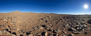 Preview wallpaper desert, stones, sand, sun