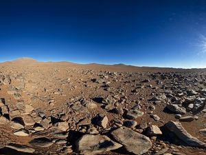 Preview wallpaper desert, stones, sand, sun