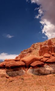 Preview wallpaper desert, stones, sky, clouds