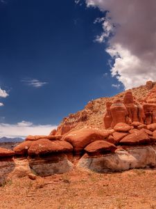 Preview wallpaper desert, stones, sky, clouds