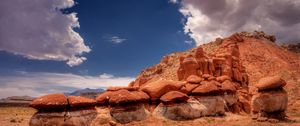 Preview wallpaper desert, stones, sky, clouds