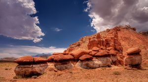 Preview wallpaper desert, stones, sky, clouds