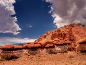 Preview wallpaper desert, stones, sky, clouds