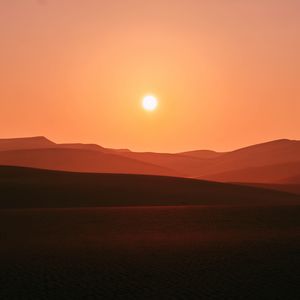 Preview wallpaper desert, sunset, hills, sand, dusk