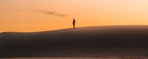 Preview wallpaper desert, sunset, silhouette, hills, sand