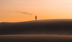 Preview wallpaper desert, sunset, silhouette, hills, sand